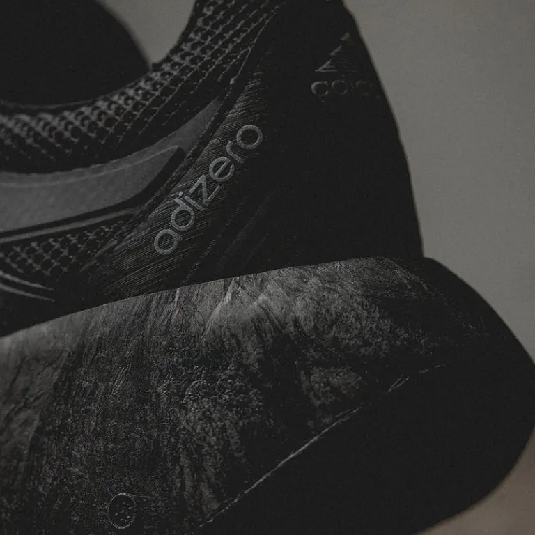 Vegane Sneaker*Adidas Adizero Aruku Core Black / Core Black / Iron Metallic