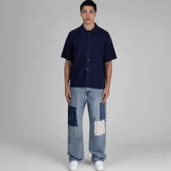 Hosen*Axel Arigato Patchwork Relaxed Jeans Light Blue