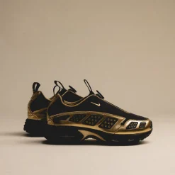 Leder Sneaker|Retro Runner*Nike Wmns Air Max SNDR SE Black / Metallic Gold / Black / Dark Smoke Grey